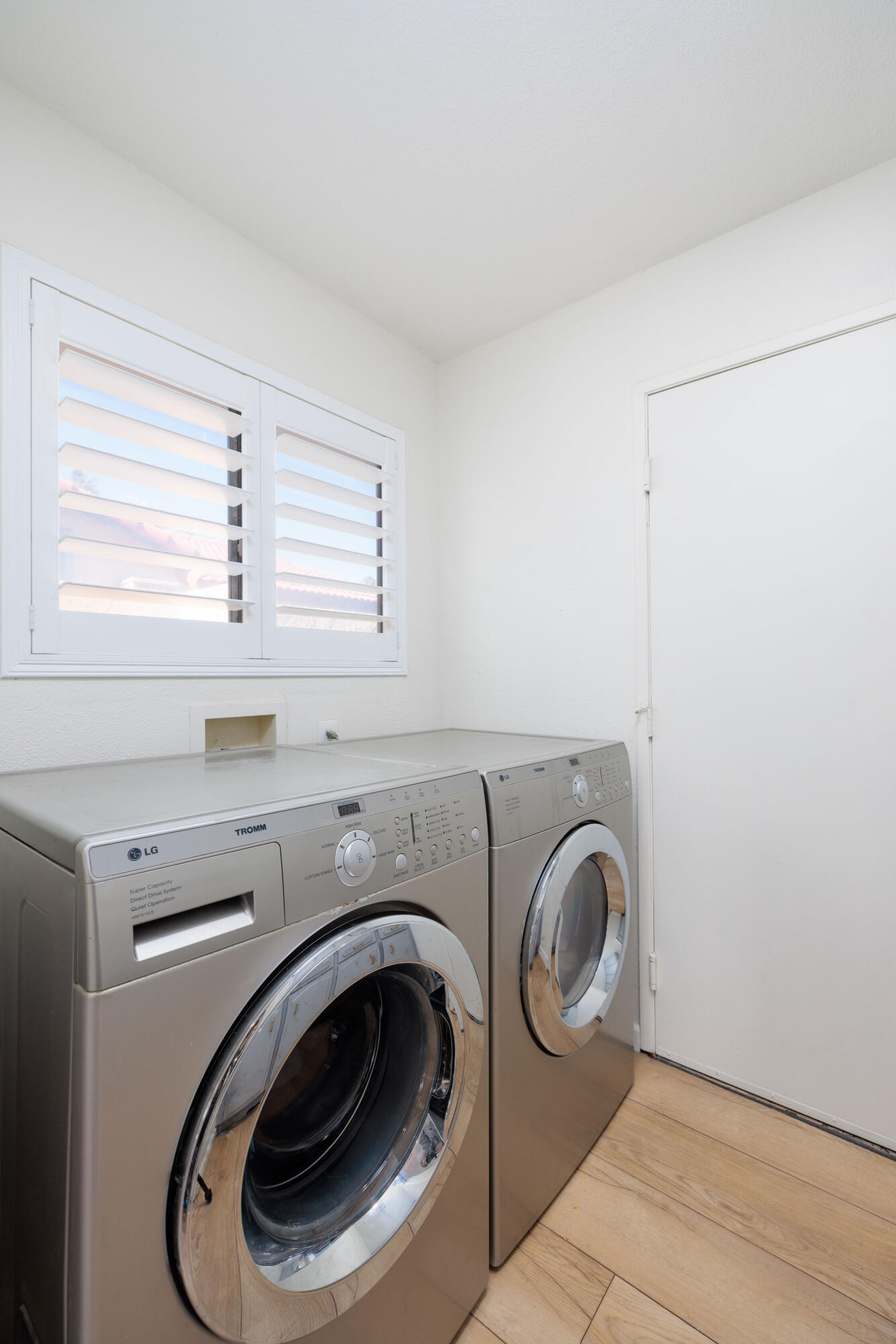 67395 Rango Road Cathedral City, CA 92234 - Photo 23 of 36 a utility room with dryer and washer