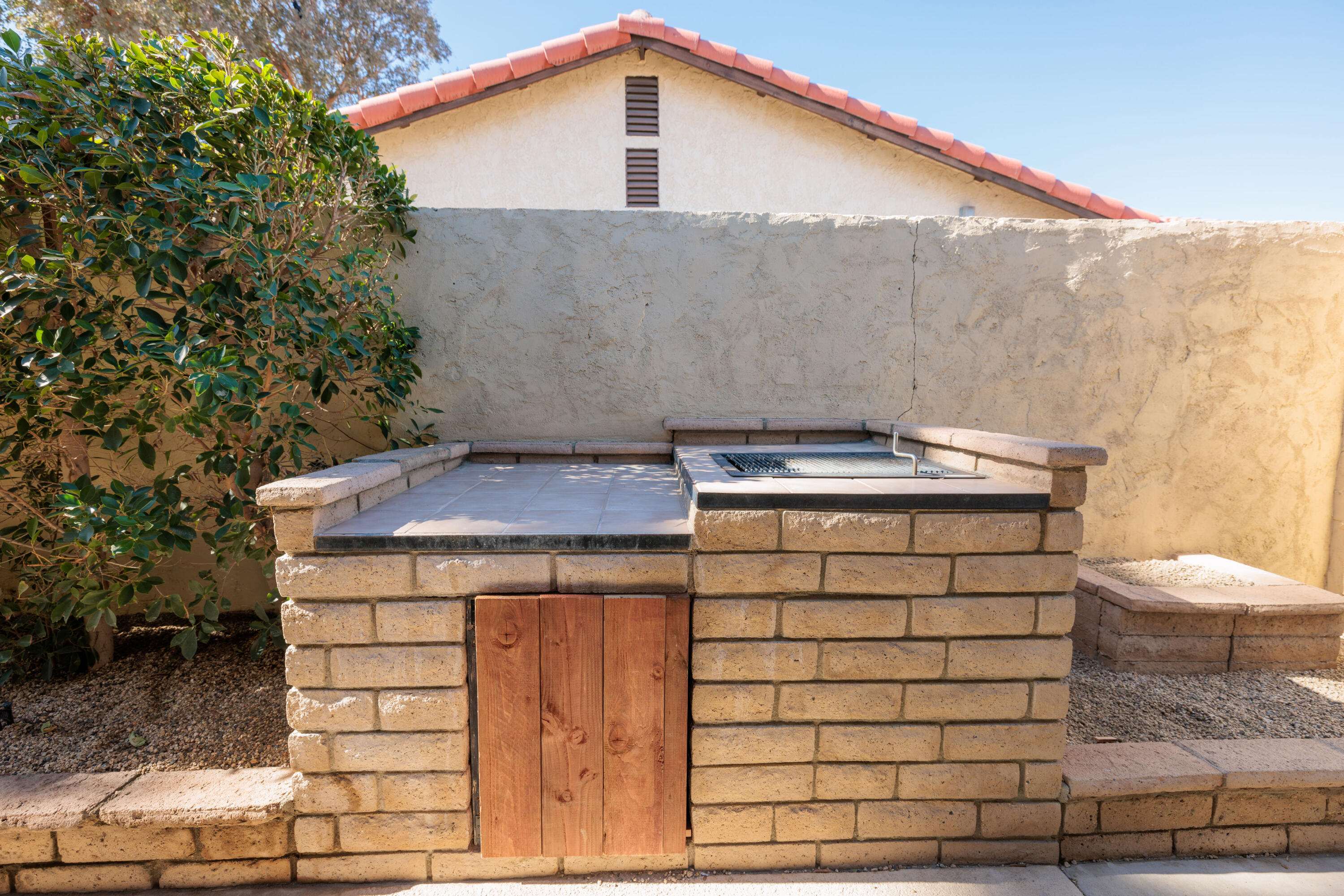 67395 Rango Road Cathedral City, CA 92234 - Photo 31 of 36 a front view of a house with parking area