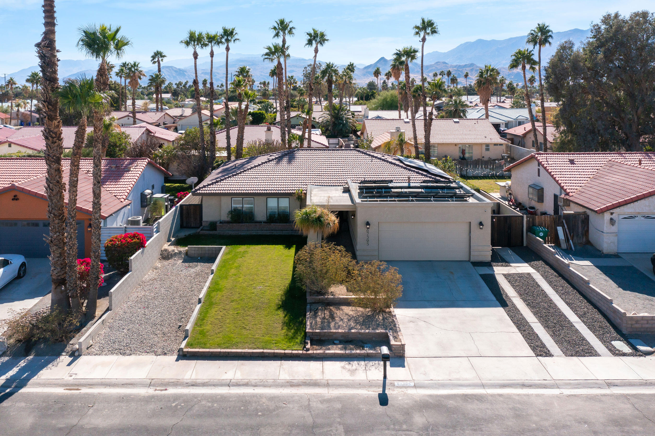 67395 Rango Road Cathedral City, CA 92234 - Photo 33 of 36 a view of multiple houses with a city