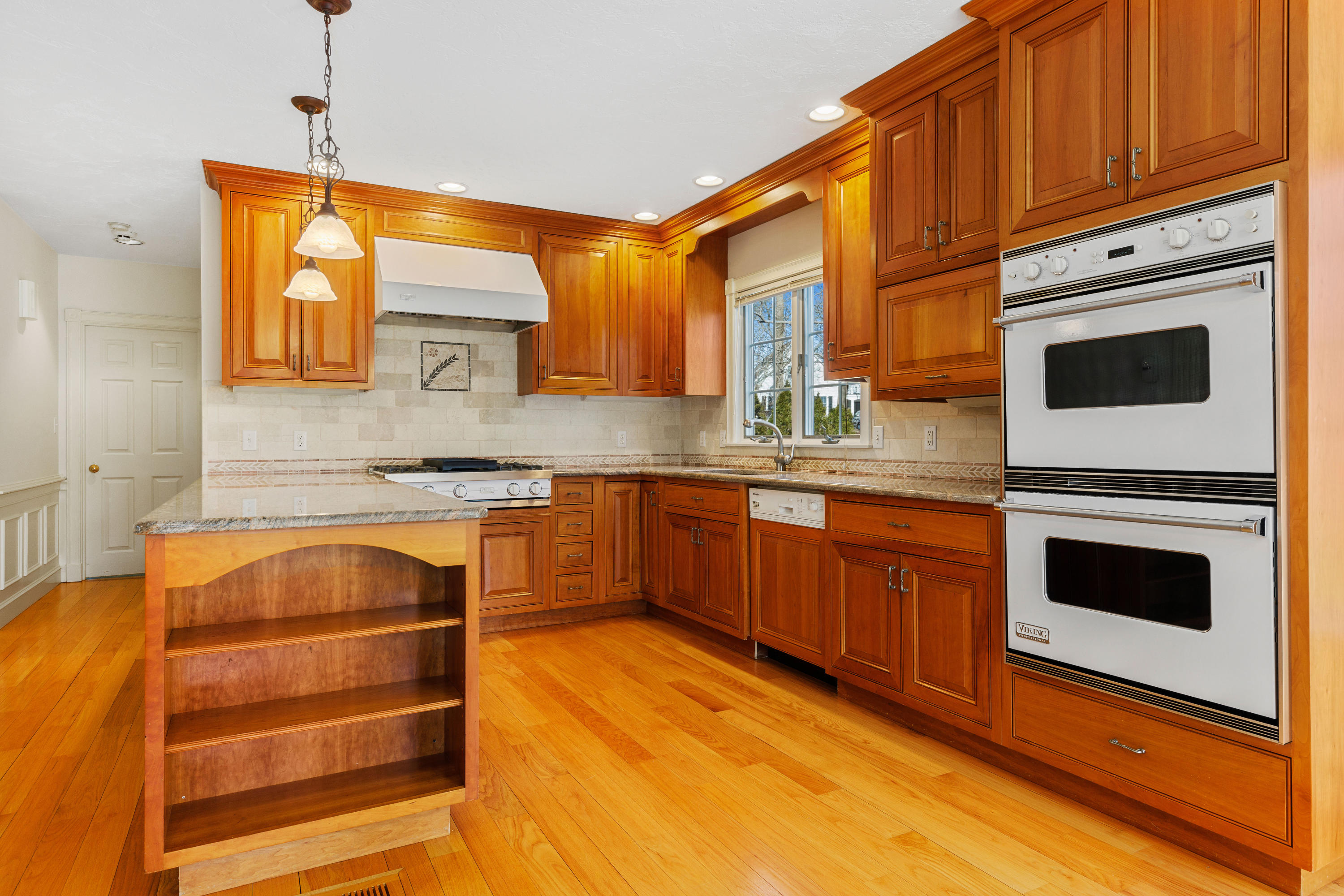 38 Parker Road Osterville, MA 02655 - Photo 14 of 58 a kitchen with stainless steel appliances a stove sink and cabinets