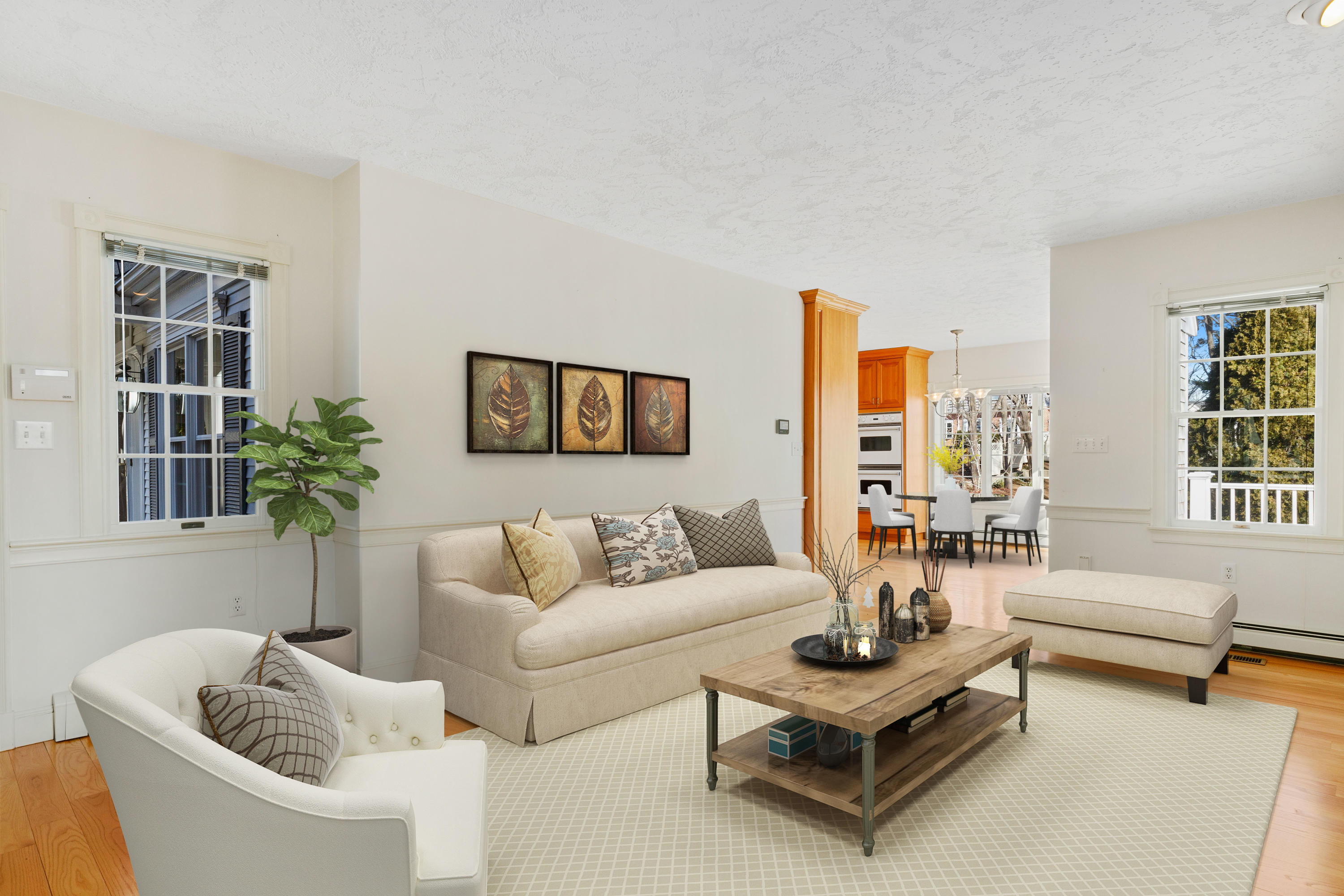 38 Parker Road Osterville, MA 02655 - Photo 21 of 58 a living room with furniture and a potted plant