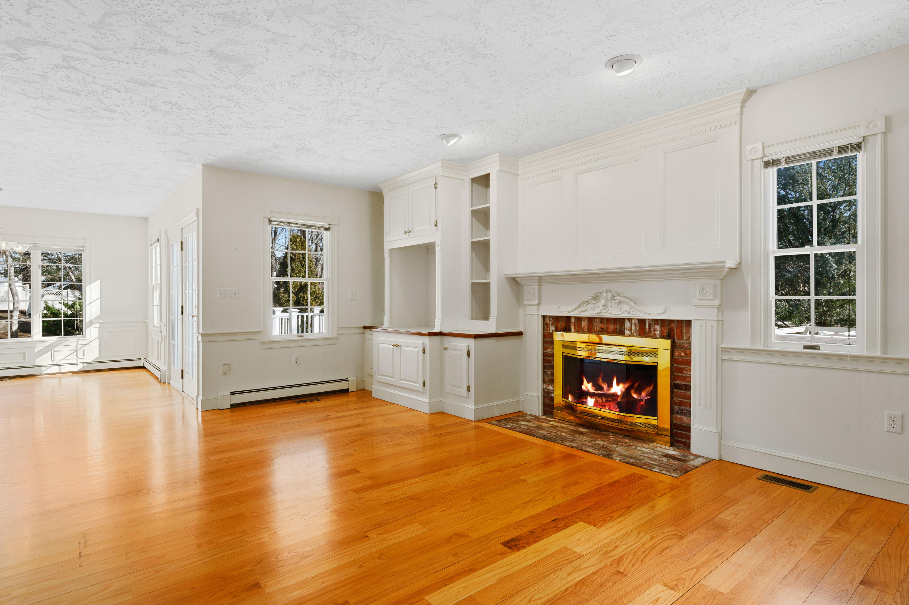 38 Parker Road Osterville, MA 02655 - Photo 23 of 58 a living room with furniture and a fireplace