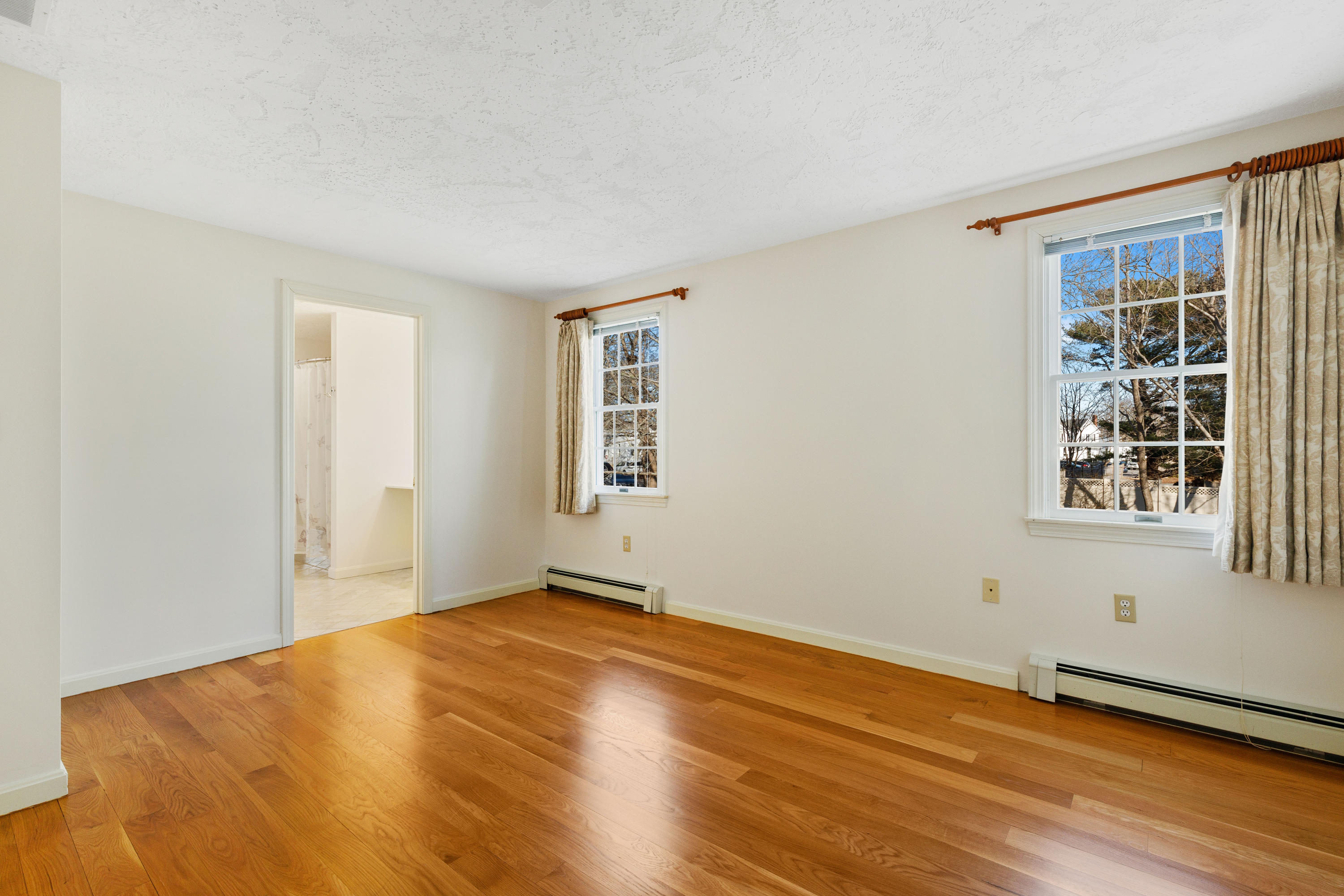 38 Parker Road Osterville, MA 02655 - Photo 30 of 58 a view of empty room with wooden floor and fan