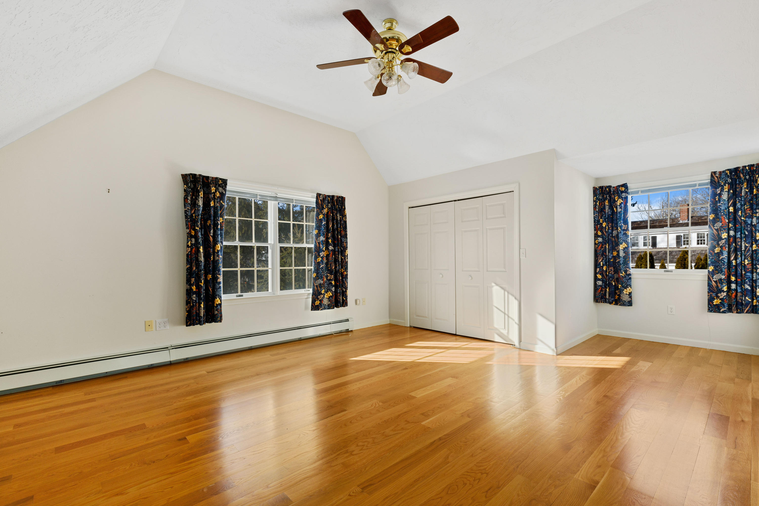 38 Parker Road Osterville, MA 02655 - Photo 37 of 58 a view of an empty room with a window and kitchen view