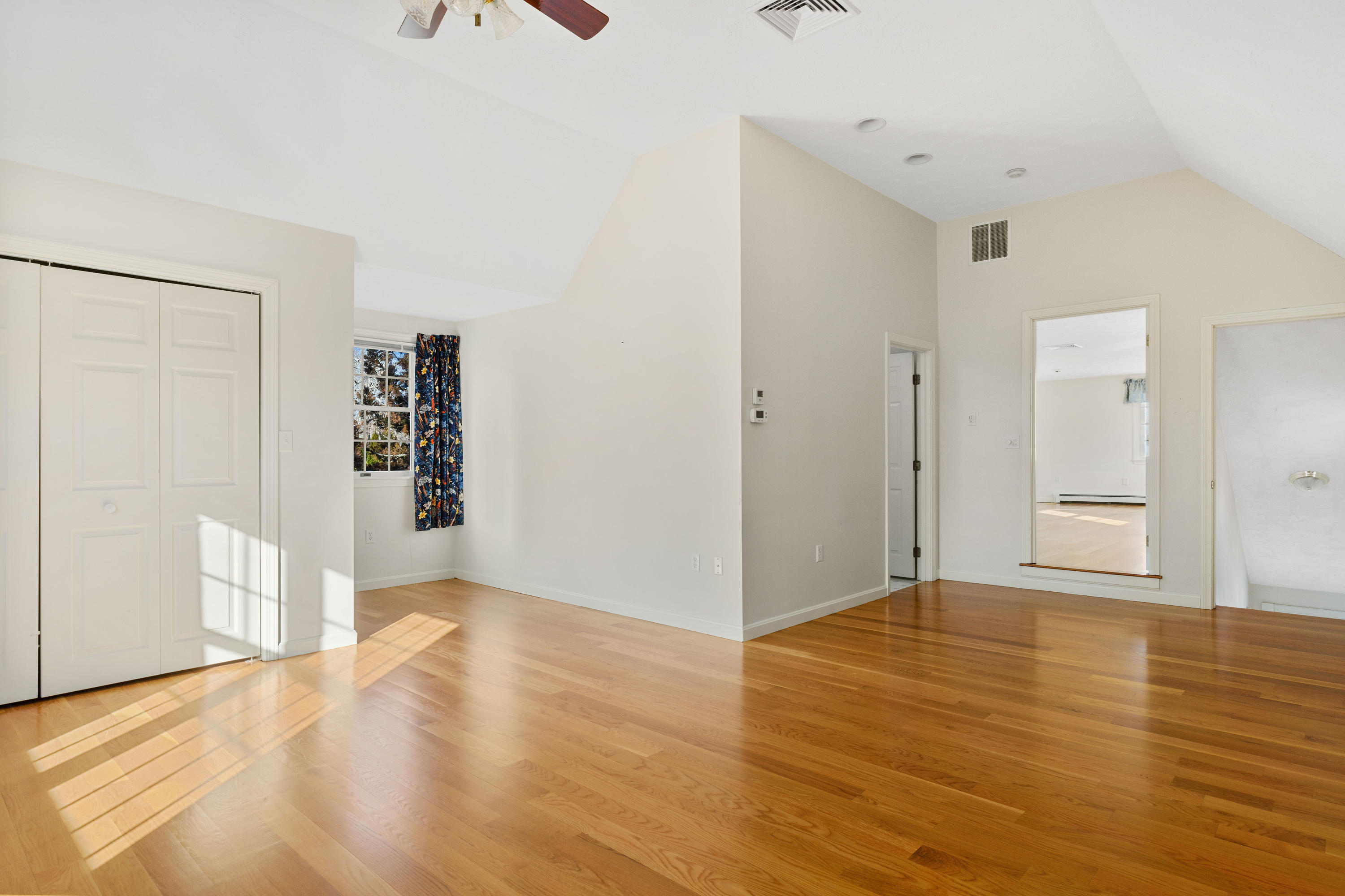 38 Parker Road Osterville, MA 02655 - Photo 38 of 58 a view of an empty room with wooden floor