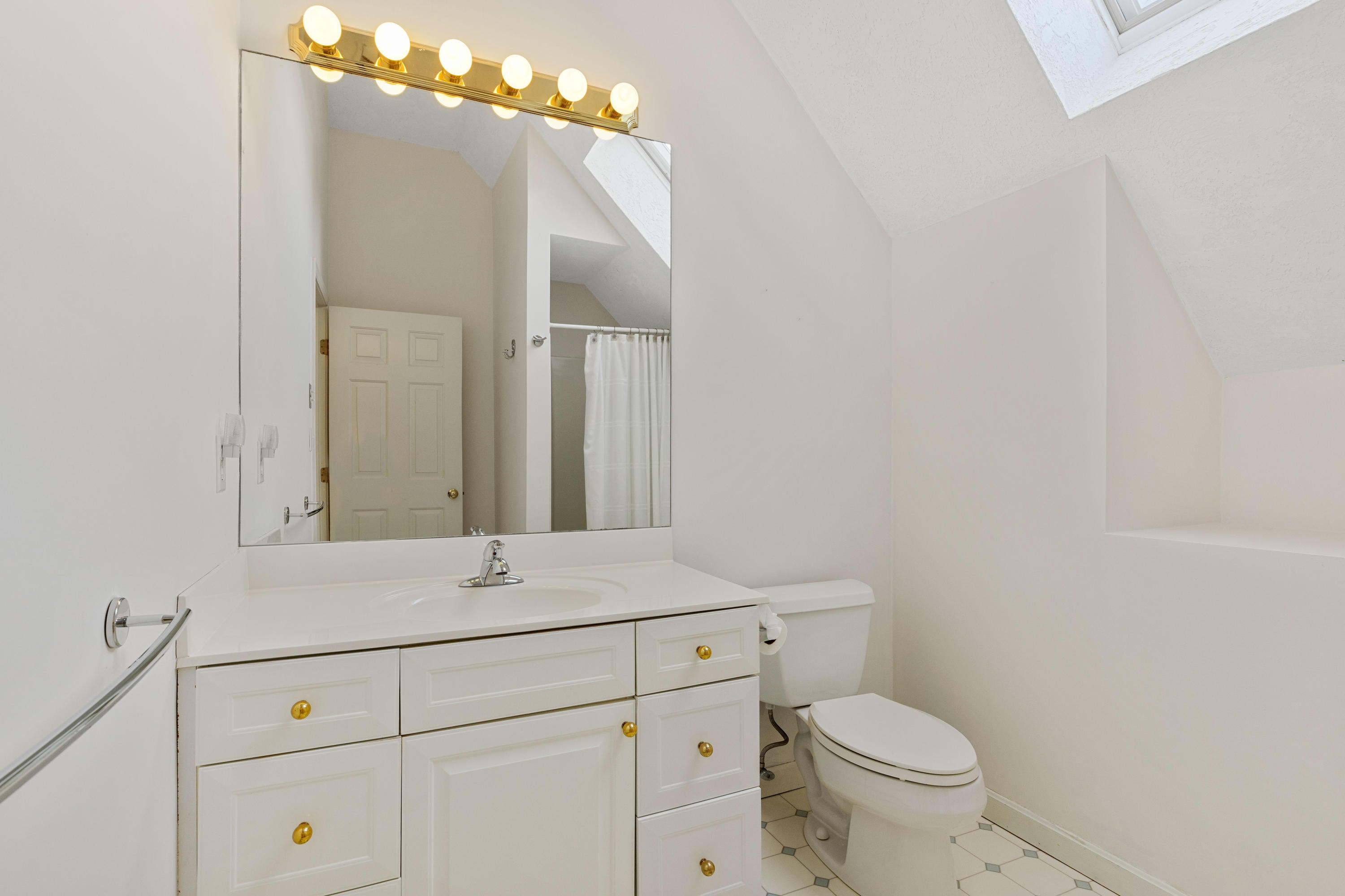 38 Parker Road Osterville, MA 02655 - Photo 39 of 58 a bathroom with a toilet sink and mirror