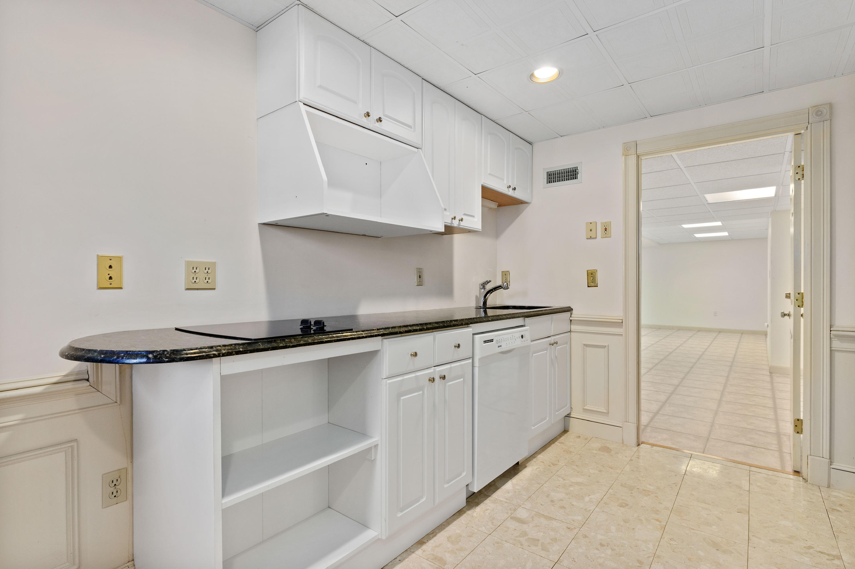 38 Parker Road Osterville, MA 02655 - Photo 45 of 58 a kitchen with stainless steel appliances granite countertop a sink and cabinets