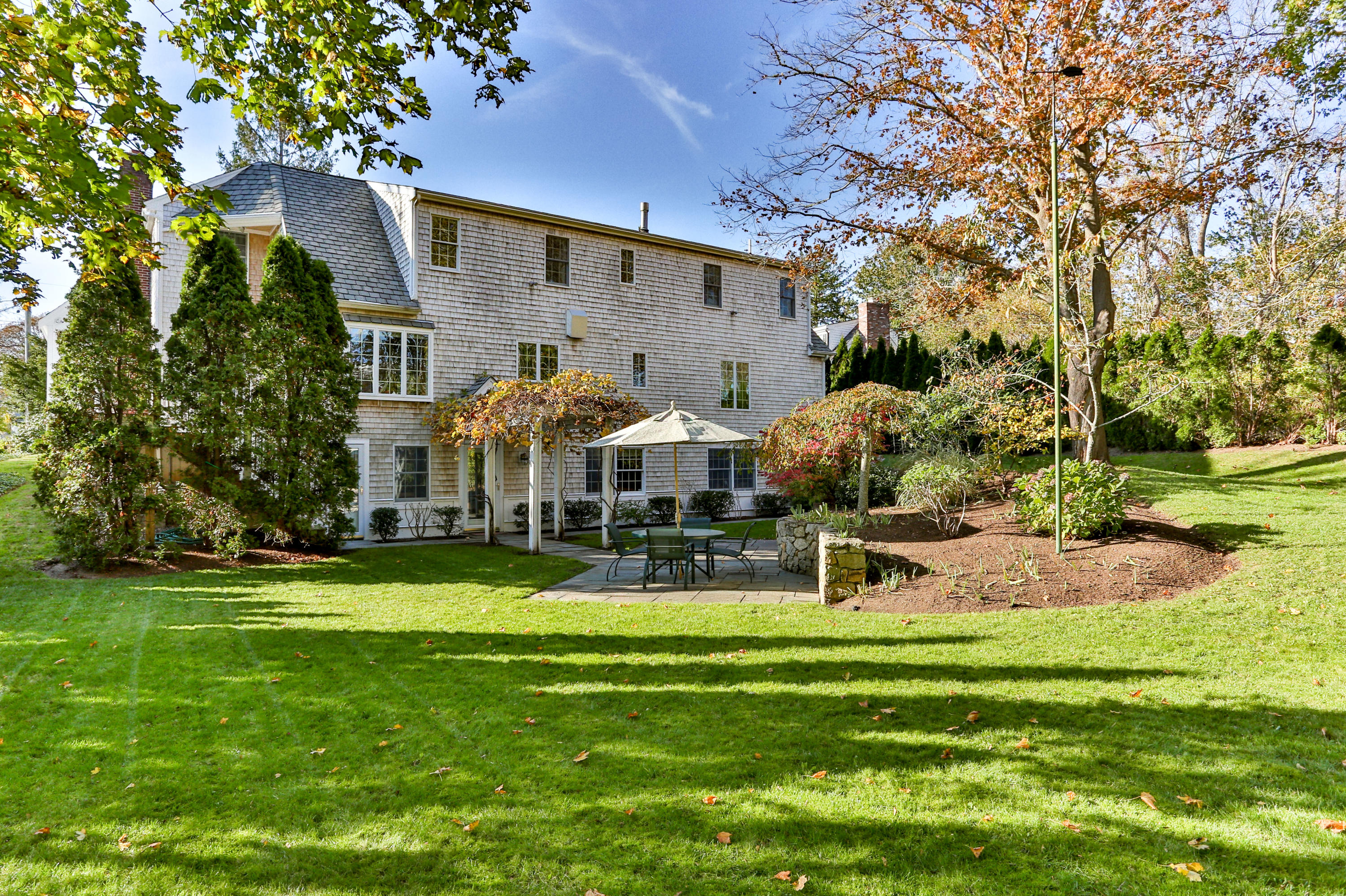 38 Parker Road Osterville, MA 02655 - Photo 51 of 58 a view of a house with a yard