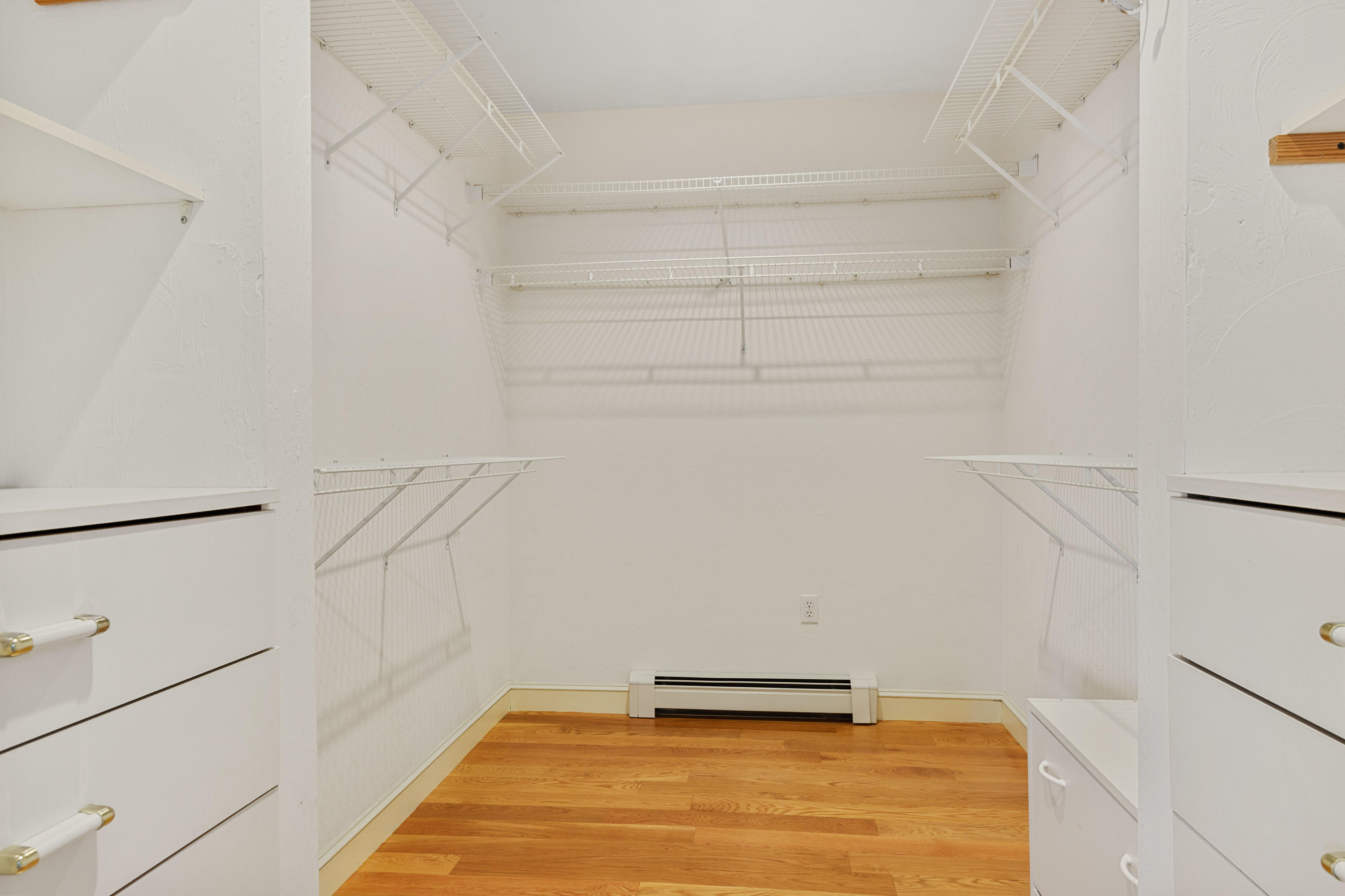 38 Parker Road Osterville, MA 02655 - Photo 8 of 58 a view of a room with racks on the wall