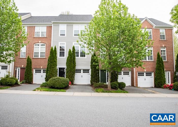 825 Rainier Road Charlottesville, VA 22903 - Photo 1 of 25 a front view of a house with a street