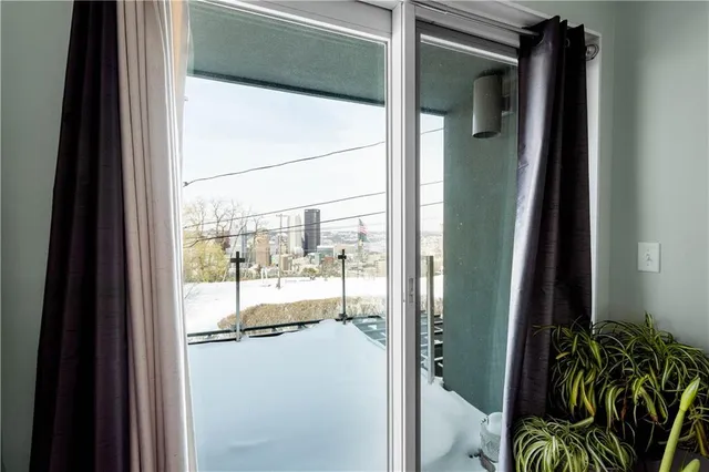 a bedroom with a bed and a chair