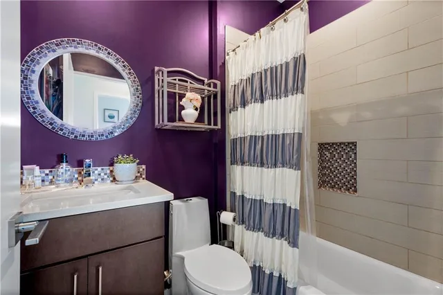 a bedroom with furniture and windows