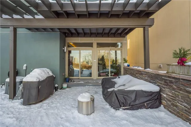 a view of a table and chairs in patio