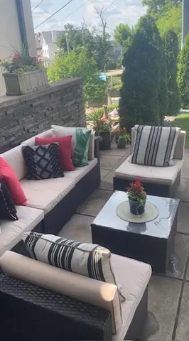 a view of outdoor space with deck and living room