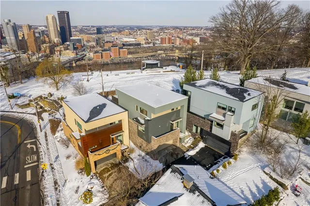 an aerial view of a house with a outdoor space