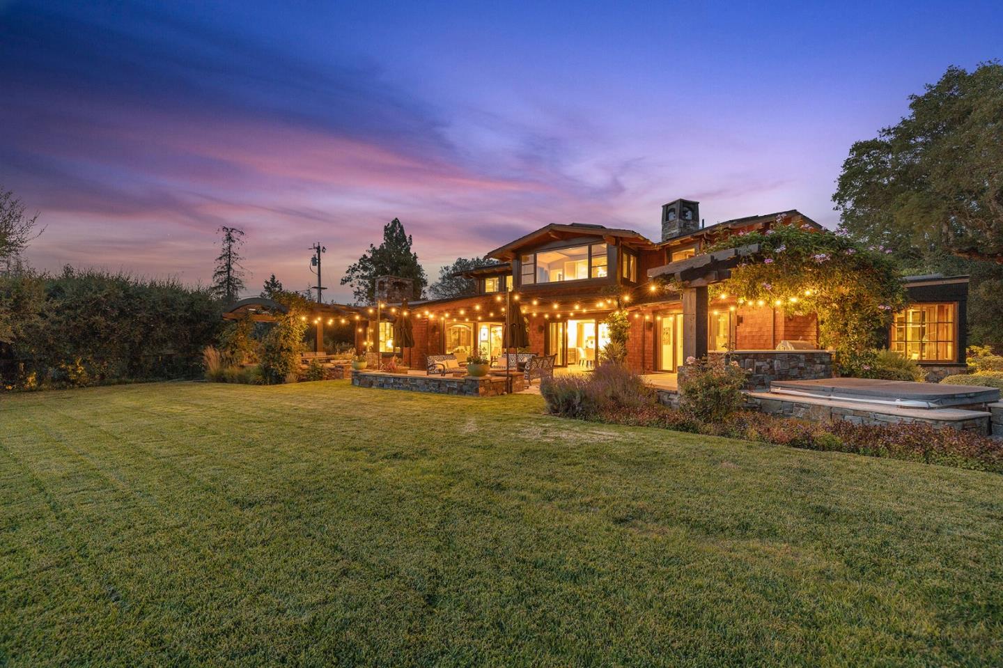 a view of a large house with a big yard