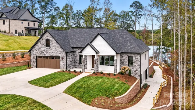 swimming pool view with a garden and plants