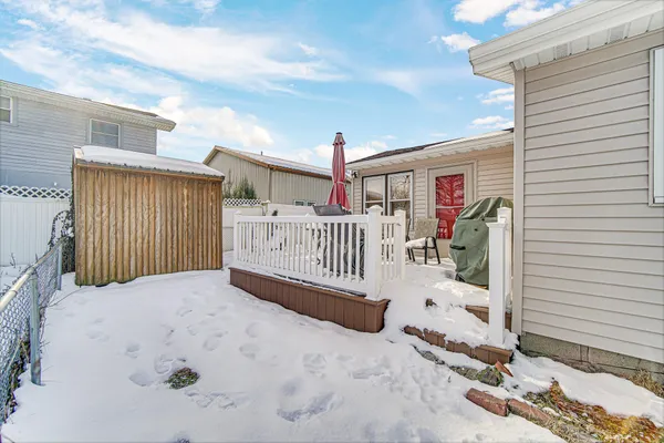 a view of backyard with seating space
