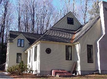 32 Sandisfield Road Monterey, MA 01245 - Photo 1 of 2 a front view of a house with parking area