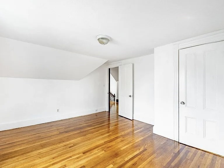 59-61 Glenwood Road, Unit 59 Somerville, MA 02145 - Photo 26 of 31 a view of empty room with wooden floor