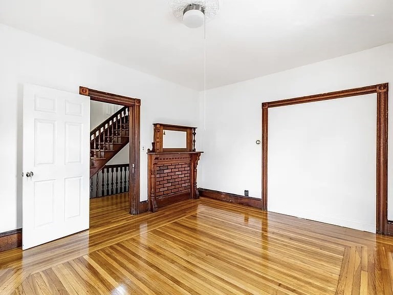59-61 Glenwood Road, Unit 59 Somerville, MA 02145 - Photo 6 of 31 a view of an empty room with wooden floor