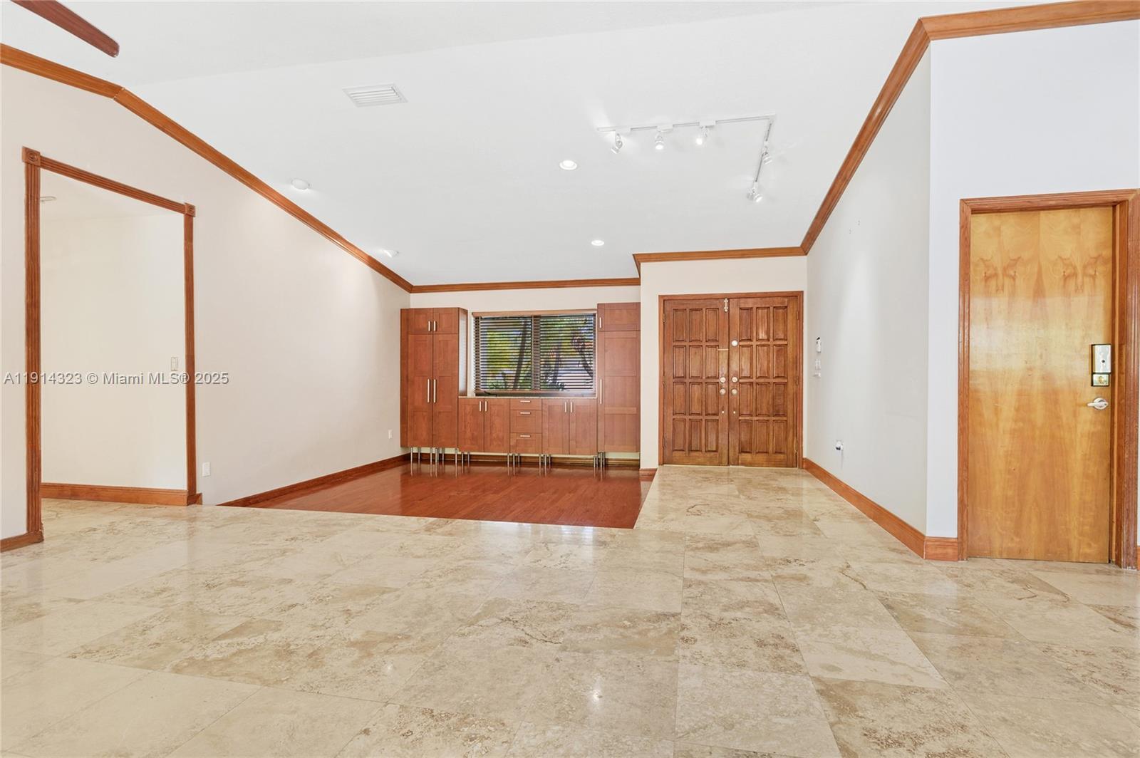 8035 Southwest 89th Court Miami, FL 33173 - Photo 8 of 31 a view of an empty room with a window