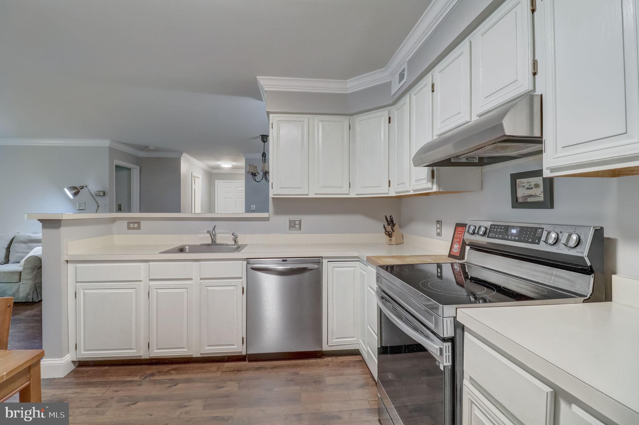 2237 Lovedale Lane, Unit 402B Reston, VA 20191 - Photo 3 of 36 Updated Kitchen