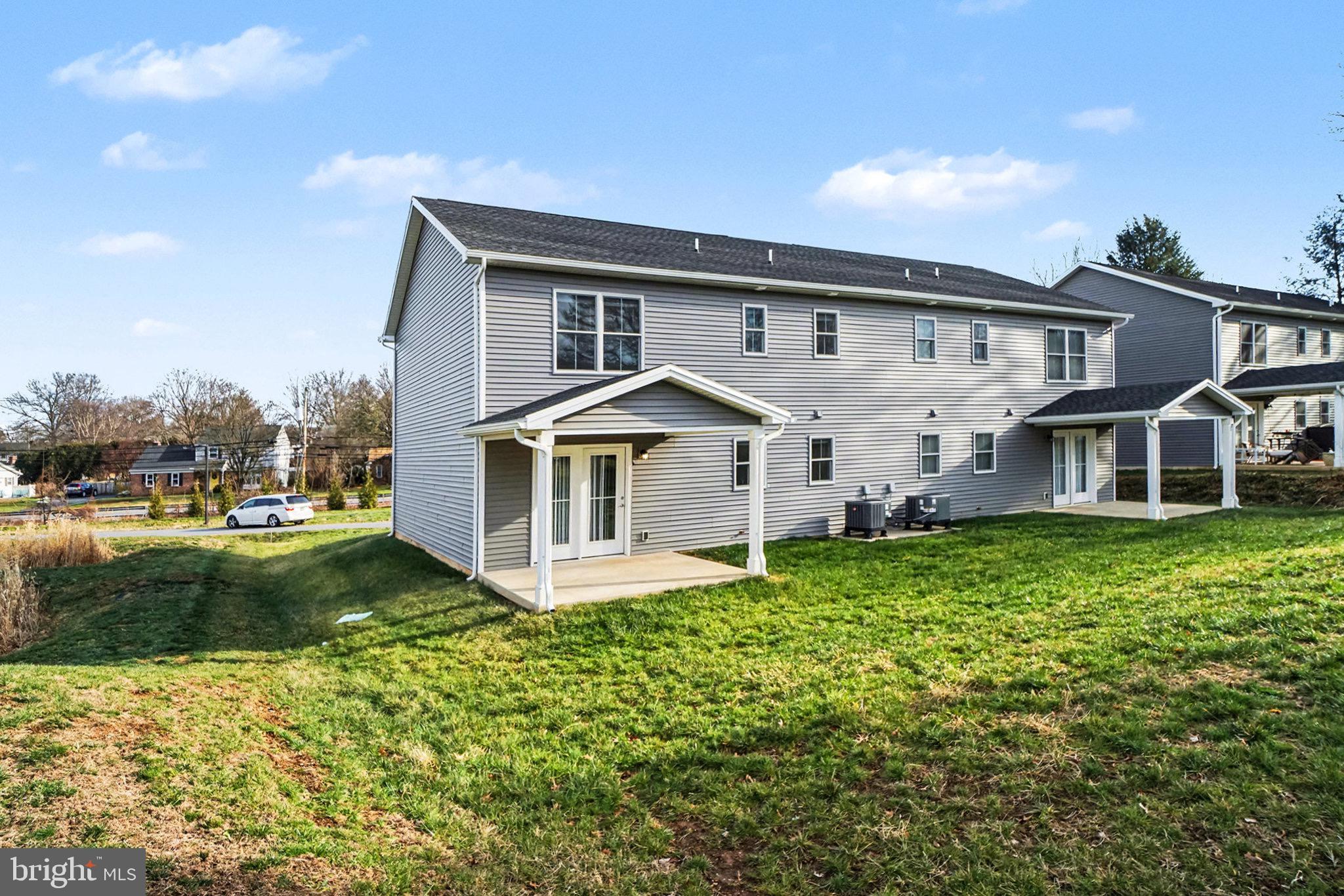 120 Hart Hershey, PA 17033 - Photo 15 of 16 a front view of a house with garden