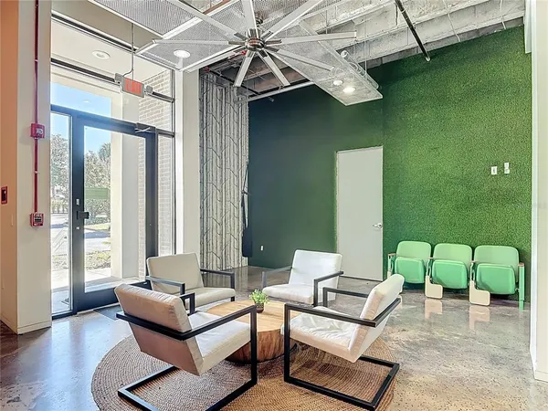 a view of a chairs and table in the patio