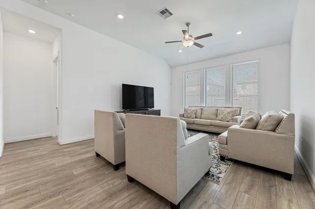 a view of a house with swimming pool