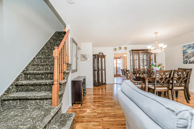 a view of a living room and entry way