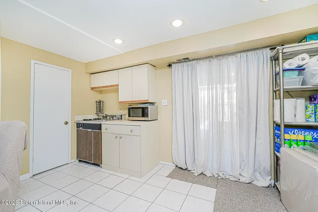 a kitchen with stainless steel appliances a stove and a refrigerator