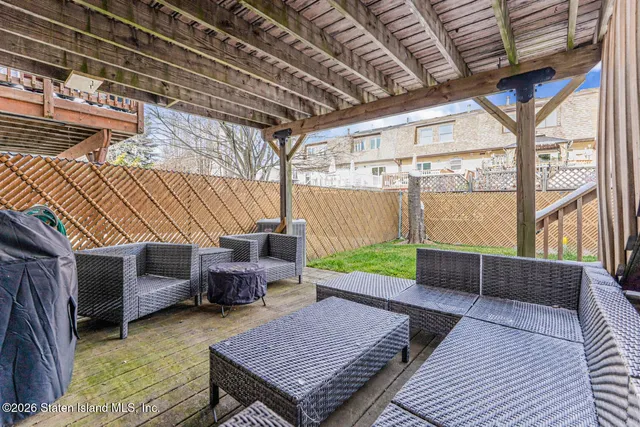 a backyard of a house with seating space