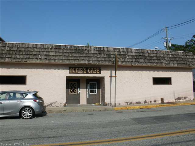 a view of parking area and car parked