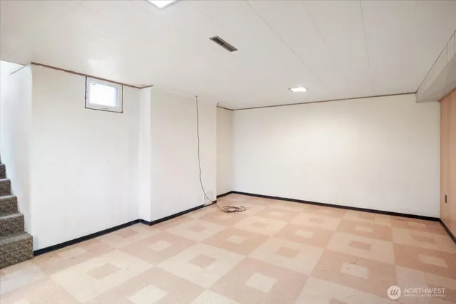 a view of a livingroom with a staircase