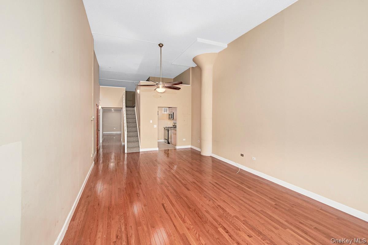 1 Landmark Square, Unit 109 Port Chester, NY 10573 - Photo 14 of 24 a view of empty room with wooden floor