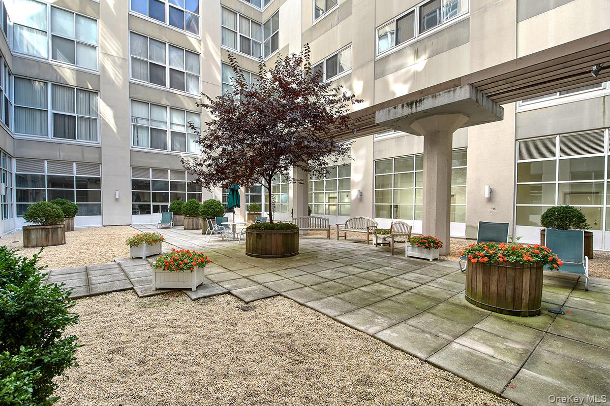 1 Landmark Square, Unit 109 Port Chester, NY 10573 - Photo 19 of 24 a view of a building with sitting area
