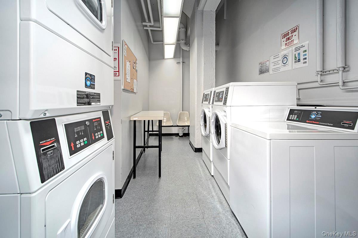 1 Landmark Square, Unit 109 Port Chester, NY 10573 - Photo 20 of 24 a utility room with dryer and washer