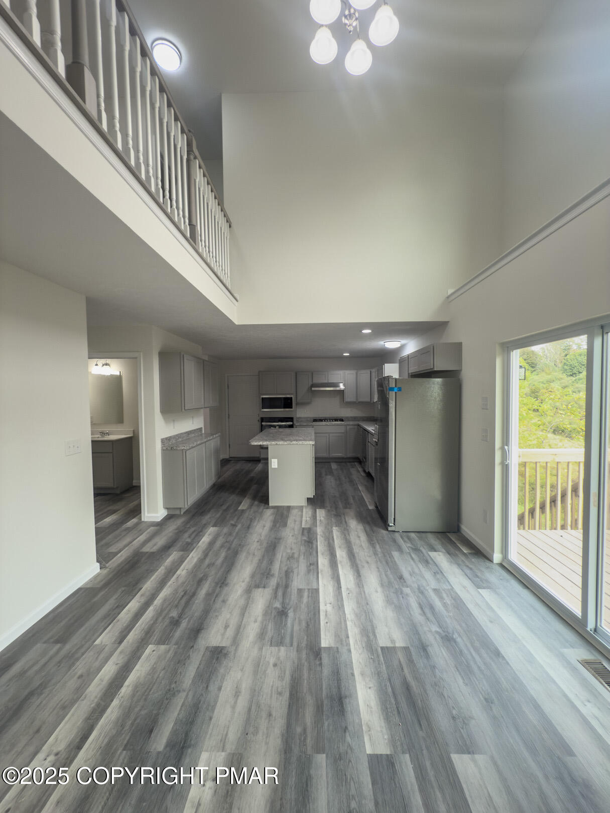 264 Mc Cole Road East Stroudsburg, PA 18302 - Photo 11 of 34 wooden floor in an empty room with a window