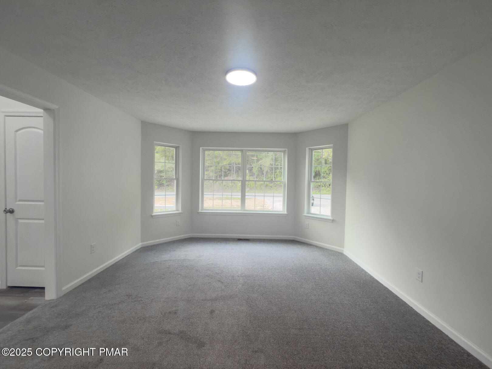 264 Mc Cole Road East Stroudsburg, PA 18302 - Photo 18 of 34 an empty room with windows