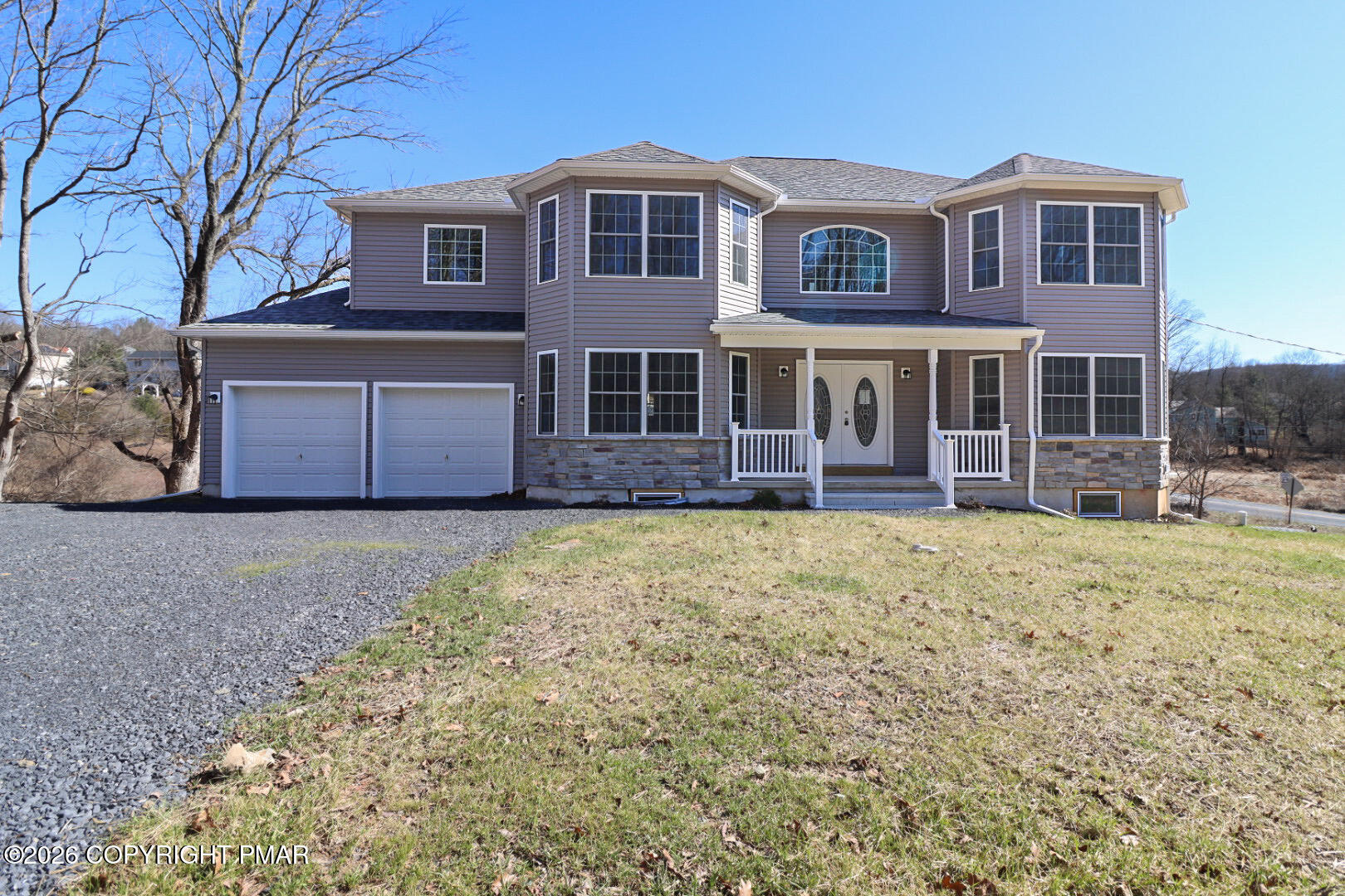 264 Mc Cole Road East Stroudsburg, PA 18302 - Photo 2 of 35 a front view of a house with garden