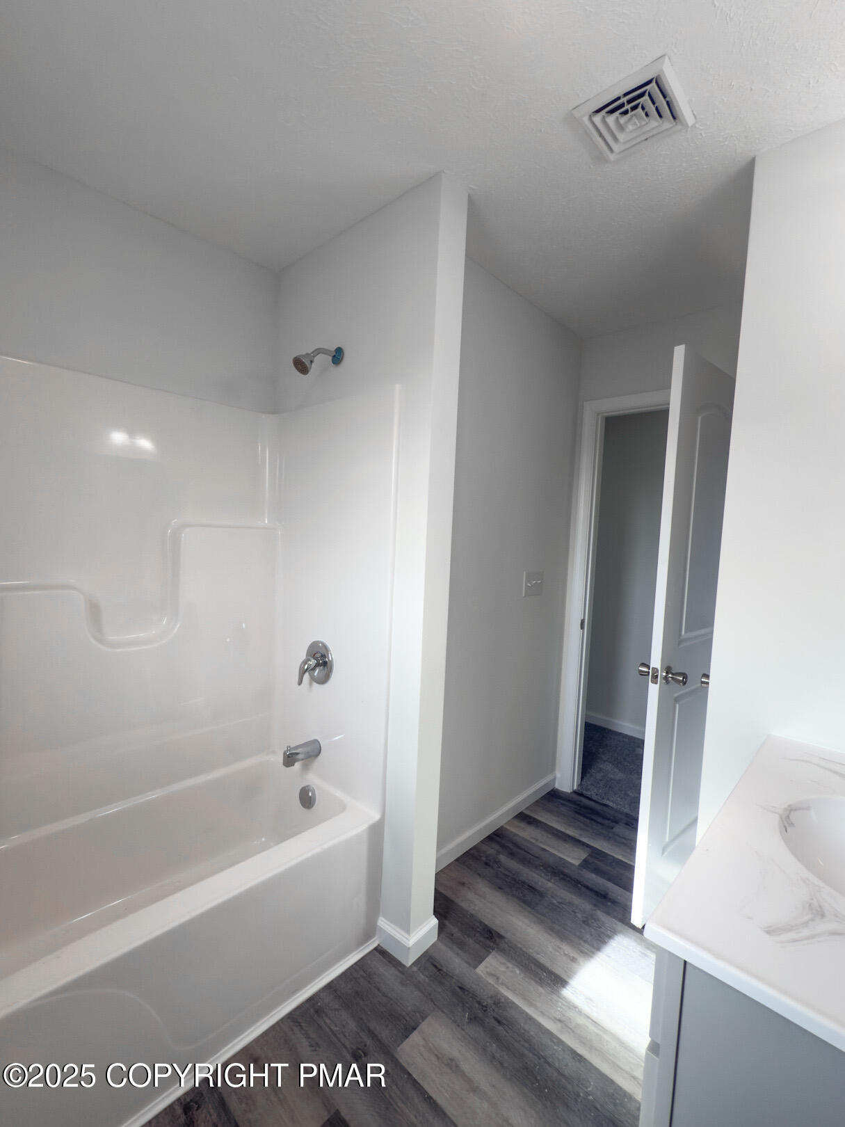 264 Mc Cole Road East Stroudsburg, PA 18302 - Photo 27 of 35 a bathroom with a tub a sink and a shower