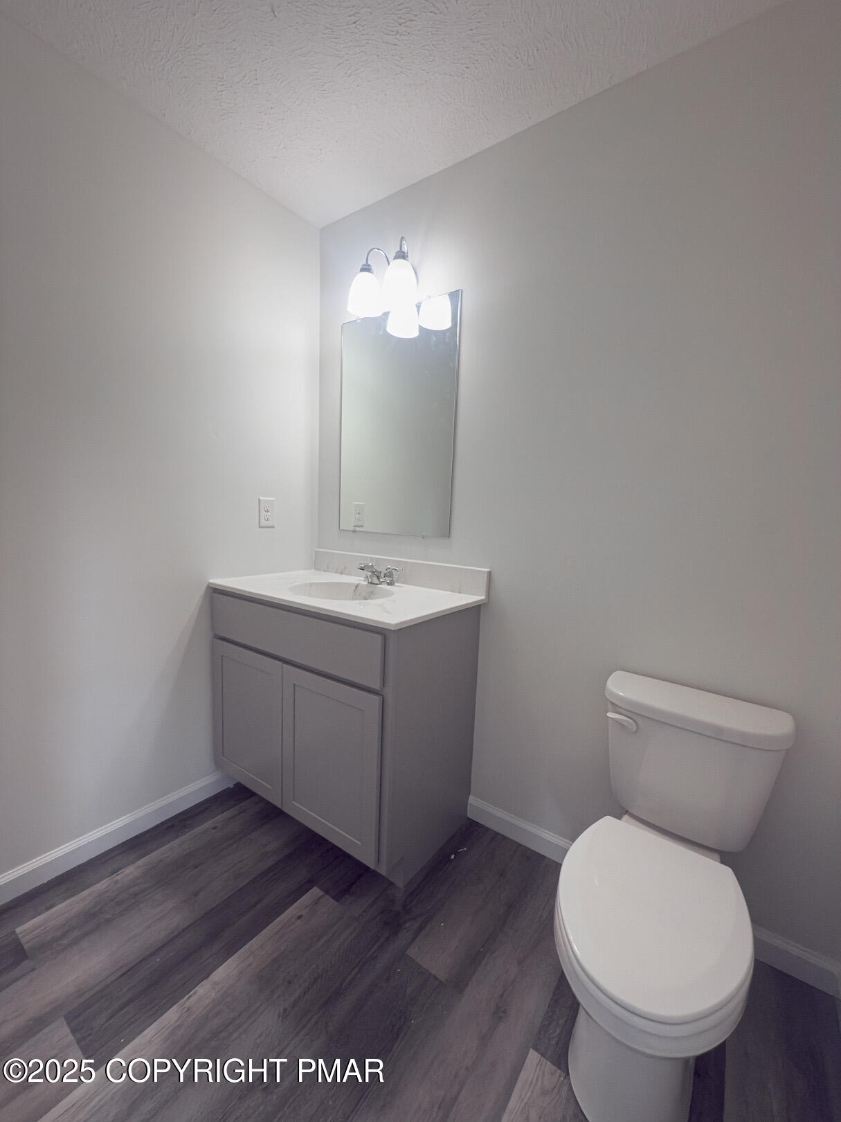 264 Mc Cole Road East Stroudsburg, PA 18302 - Photo 6 of 34 a bathroom with a toilet sink and mirror