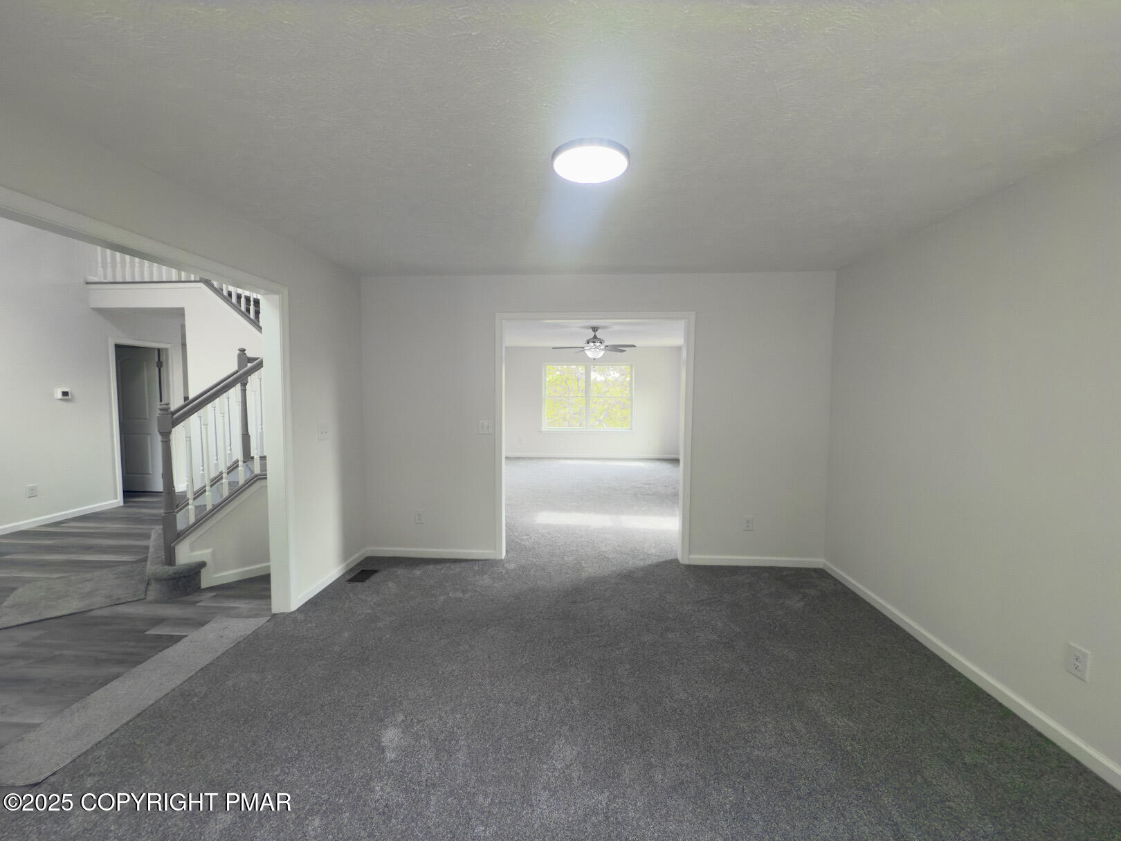 264 Mc Cole Road East Stroudsburg, PA 18302 - Photo 9 of 35 an empty room with windows