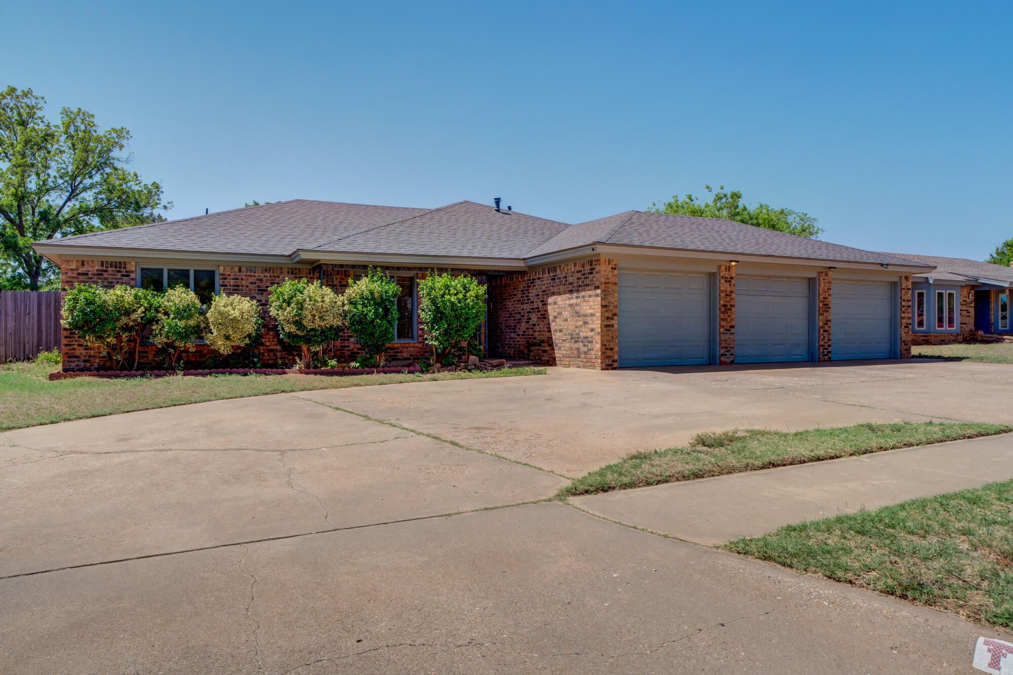 5523 74th Street Lubbock, TX 79424 - Photo 1 of 18 a front view of house with a yard