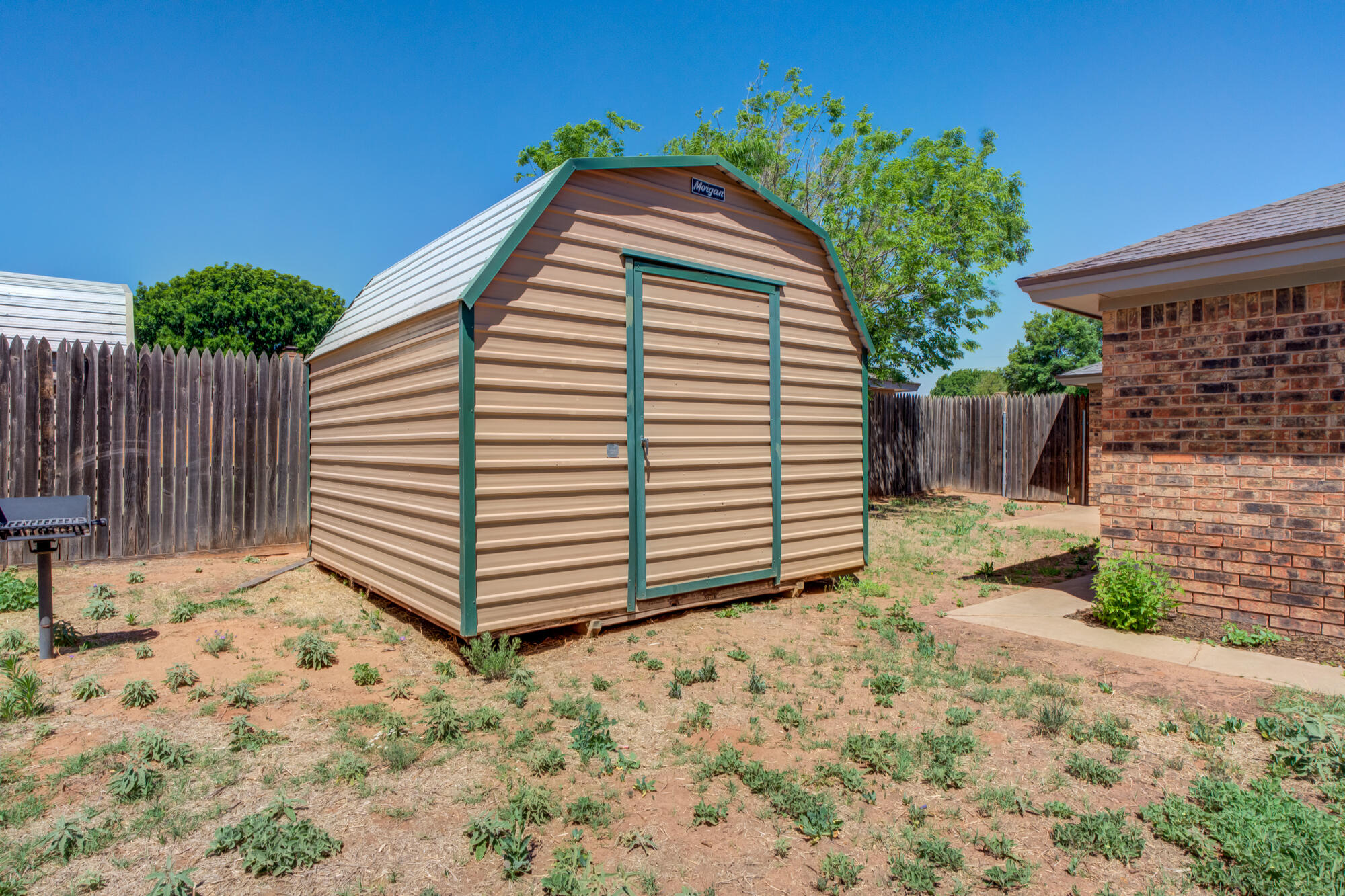 5523 74th Street Lubbock, TX 79424 - Photo 18 of 18 a view of a house with a yard