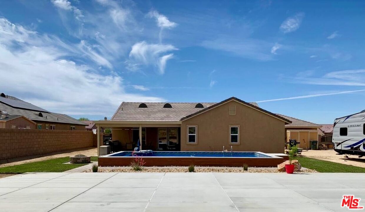 17794 Cabazon Road Apple Valley, CA 92307 - Photo 2 of 3 a view of a house with outdoor space and sitting area