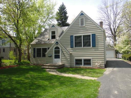 4632 Wolf Road Western Springs, IL 60558 - Photo 1 of 16 a front view of a house with a yard
