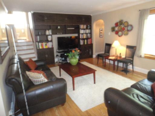 4632 Wolf Road Western Springs, IL 60558 - Photo 3 of 16 a living room with furniture and wooden floor