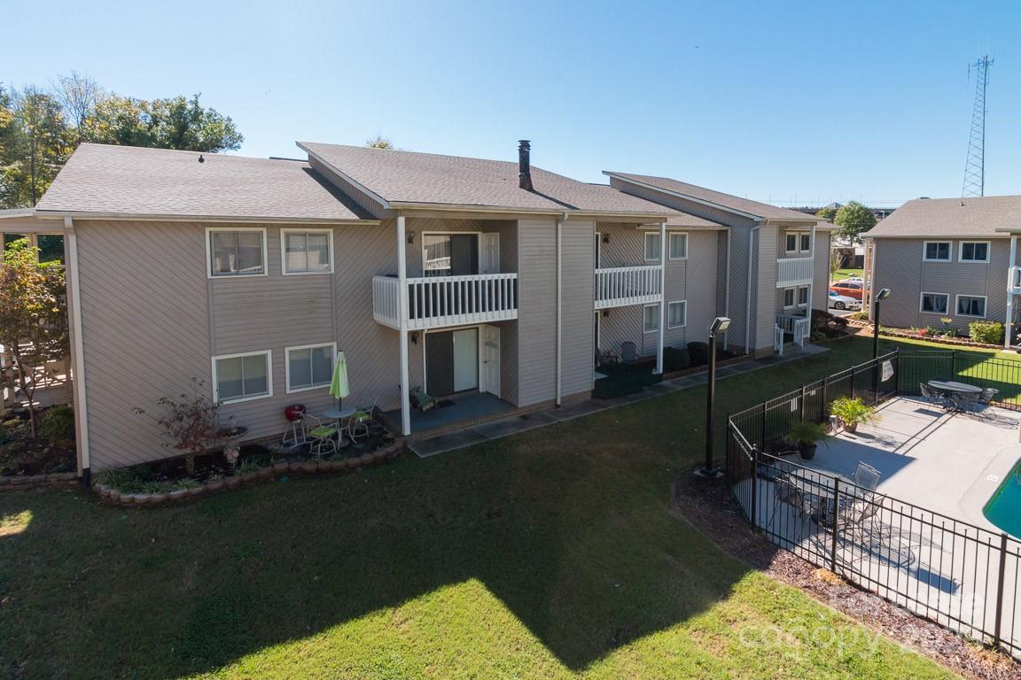 a aerial view of a house with a yard